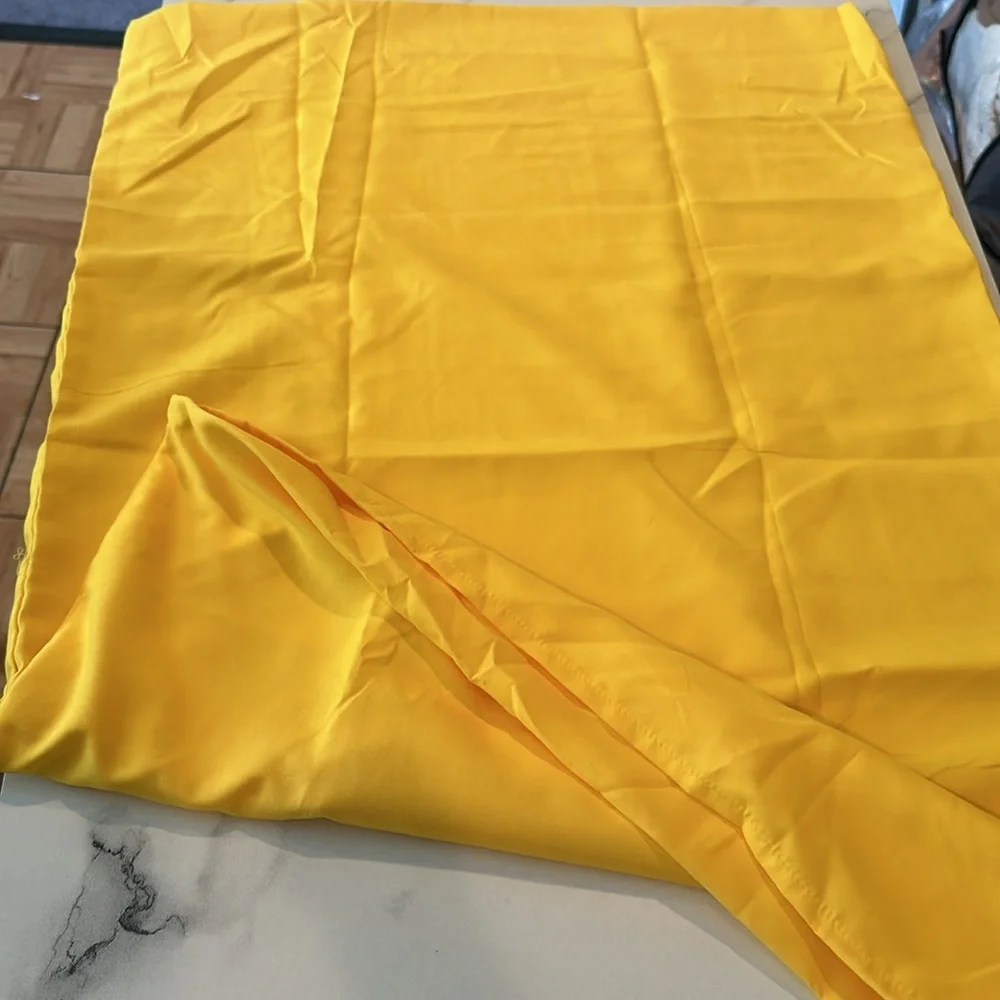 One new in bag yellow queen size pillow case